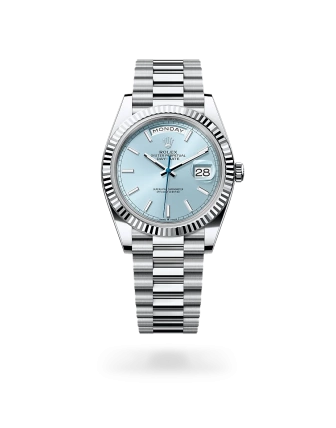Rolex Day-Date 40 in platinum with an ice blue dial, fluted bezel, and President bracelet - AH Riise
