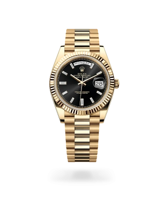 Rolex Day-Date 40 in yellow gold with a Bright black dial set with diamonds, fluted bezel, and President bracelet, m228238-0004 - AH Riise