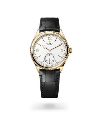 Rolex 1908 in 18kt yellow gold with an intense white dial, domed and fluted bezel, and Leather strap bracelet - AH Riise