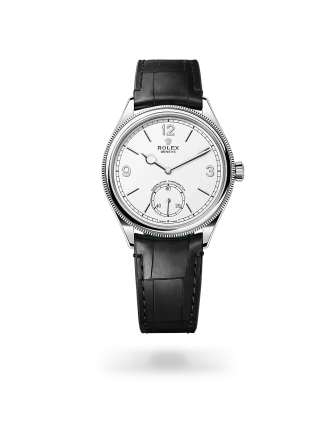 Rolex 1908 in 18kt white gold with an intense white dial, domed and fluted bezel, and Leather strap bracelet - AH Riise