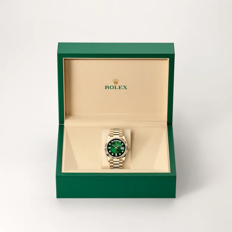 Rolex Day-Date 36 in yellow gold, Green ombré dial set with diamonds, fluted bezel, and President bracelet - AH Riise