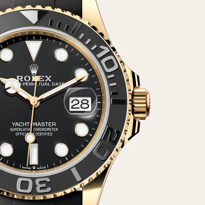Rolex Yacht-Master 42 in yellow gold with a black dial, matt black Cerachrom insert in ceramic bezel, and Oysterflex bracelet - AH Riise