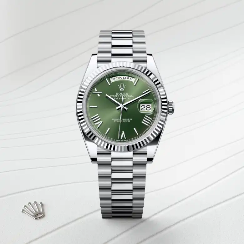 Rolex Day-Date 40 in platinum with an Olive green dial, fluted bezel, and President bracelet - AH Riise
