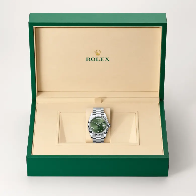 Rolex Day-Date 40 in platinum with an Olive green dial, fluted bezel, and President bracelet - AH Riise