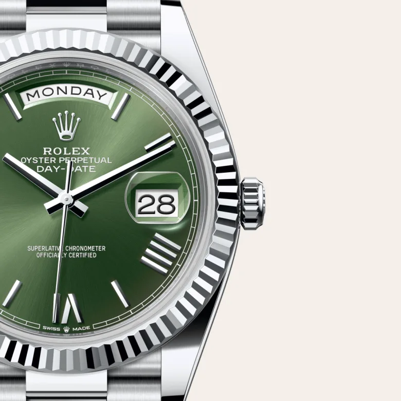 Rolex Day-Date 40 in platinum with an Olive green dial, fluted bezel, and President bracelet - AH Riise