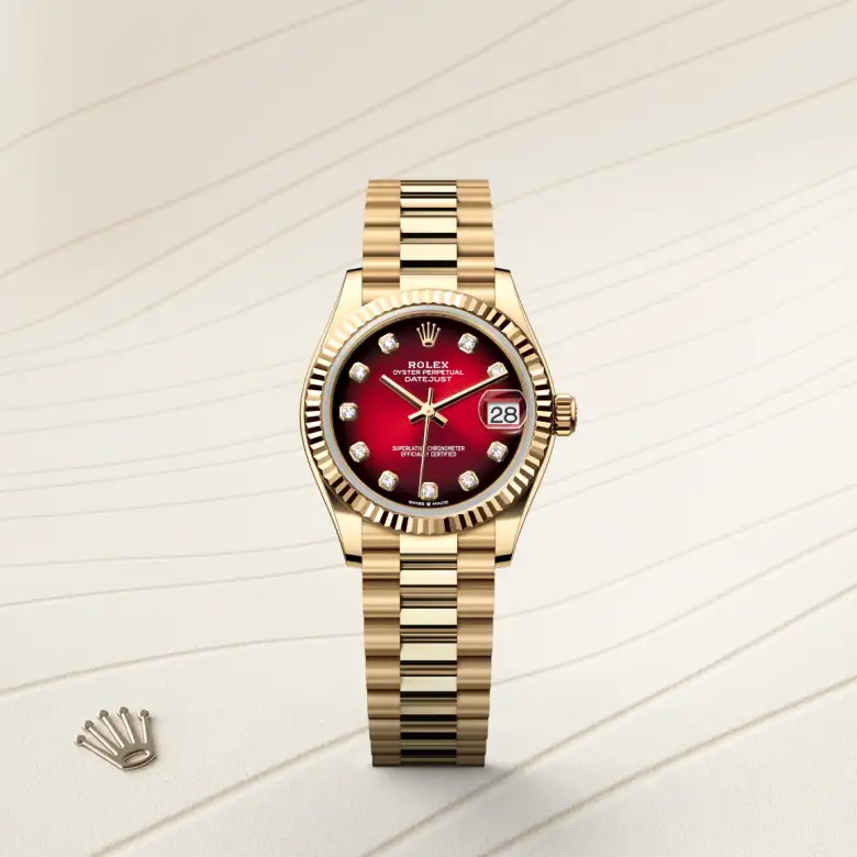 Rolex Datejust 31 in yellow gold with a Red ombré dial set with diamonds, fluted bezel, and President bracelet - AH Riise