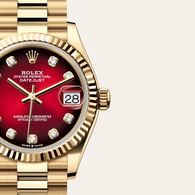 Rolex Datejust 31 in yellow gold with a Red ombré dial set with diamonds, fluted bezel, and President bracelet - AH Riise
