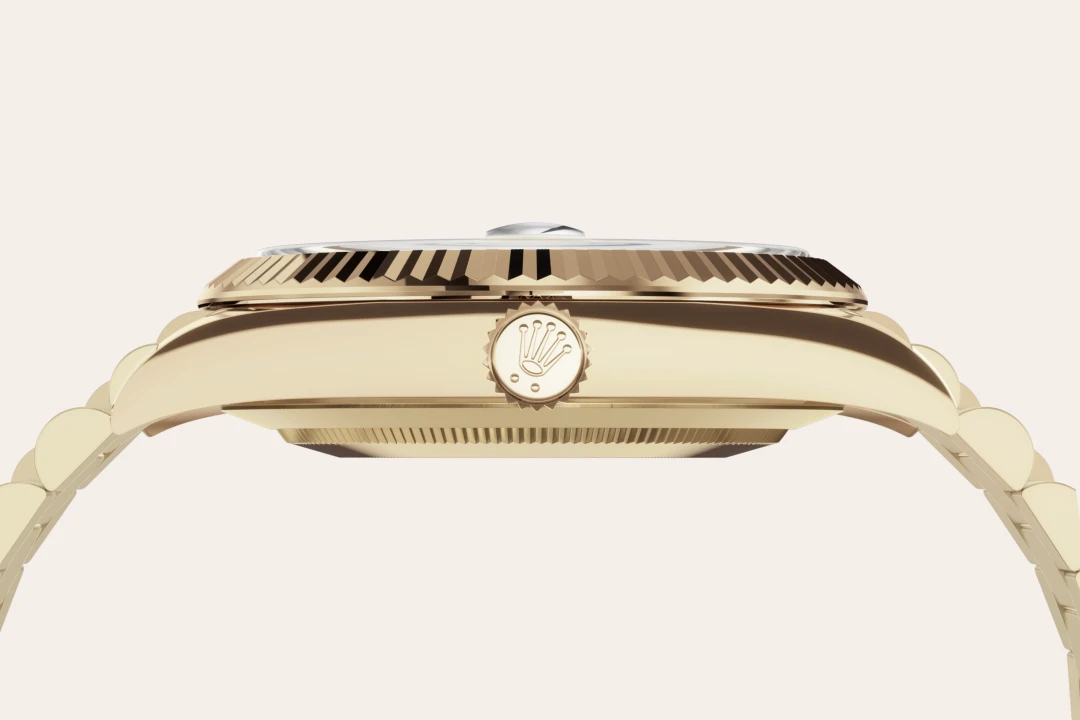 Rolex Day-Date 40 in yellow gold with a Green dial, fluted bezel, and President bracelet, m228238-0061 - AH Riise Rolex Day-Date 40 in yellow gold with a Green dial, fluted bezel, and President bracelet, m228238-0061 - AH Riise