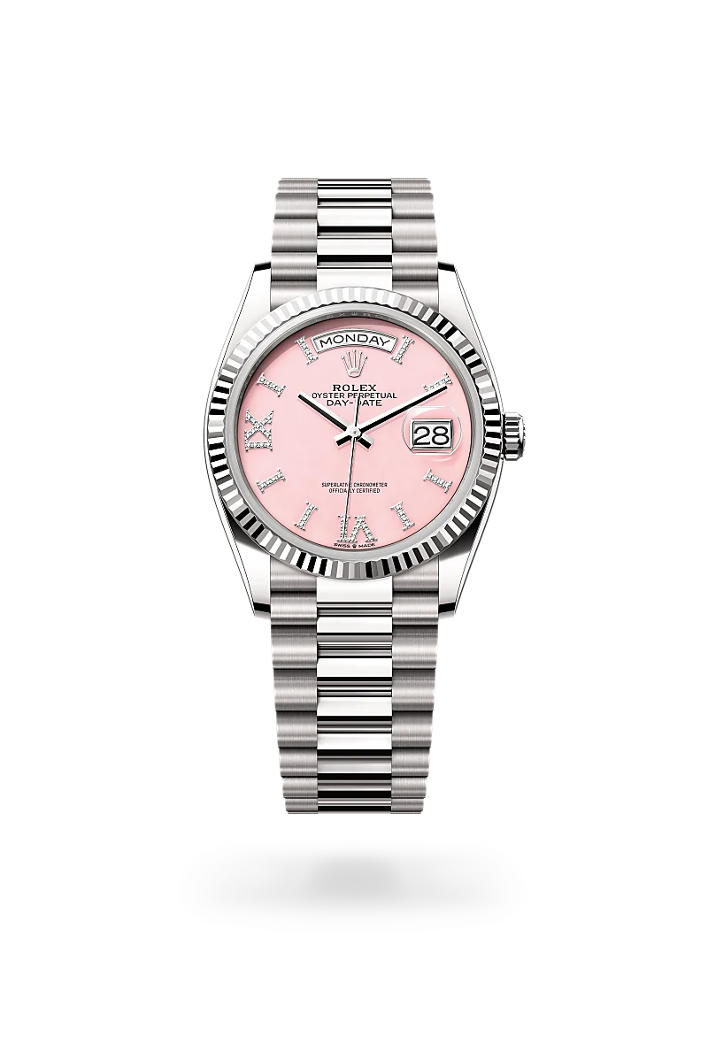 Rolex Day-Date 36 in white gold, Pink opal dial set with diamonds, fluted bezel, and President bracelet - AH Riise